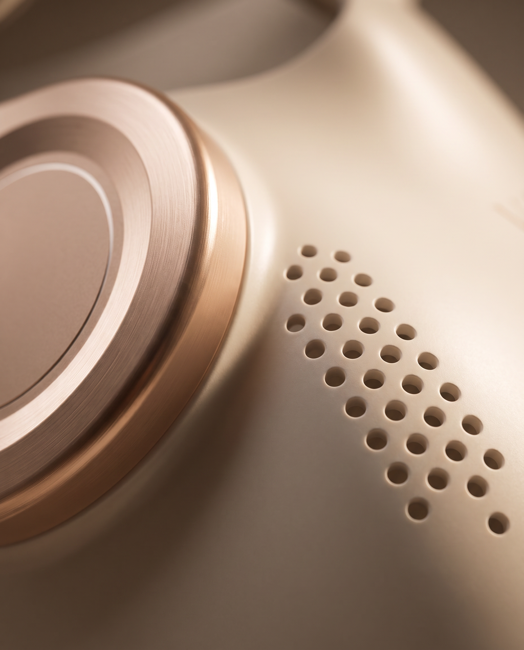 Close-up detail of the Vellinta Lumina Pro rose-gold control dial and silicone vent perforations