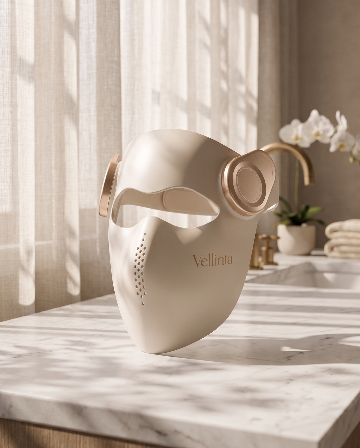 Vellinta Lumina Pro mask on a white marble bathroom vanity in morning light