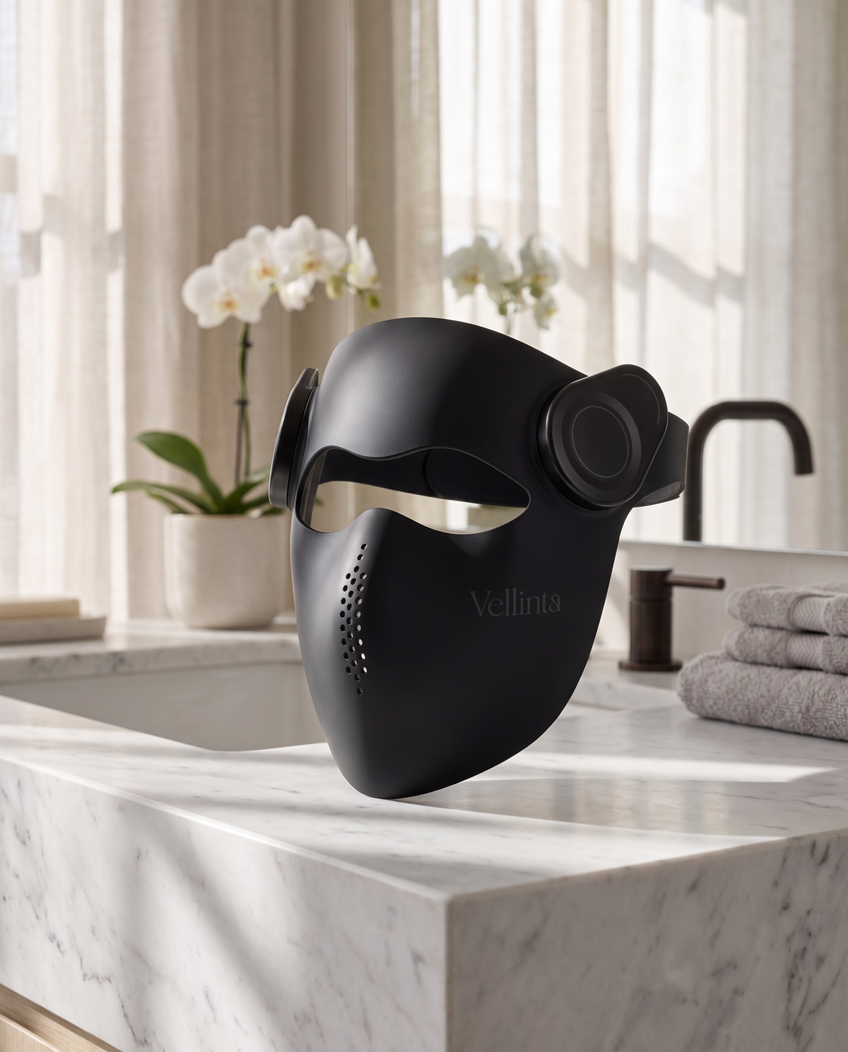 Vellinta Lumina Pro in Onyx on a white marble bathroom vanity in morning light